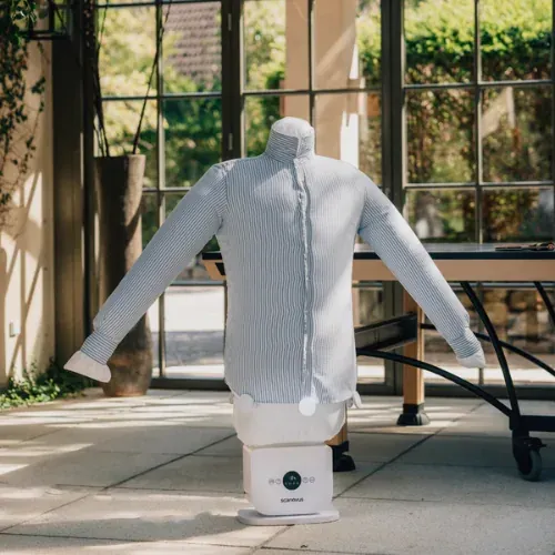Automatic ironing machine with a pressed striped shirt